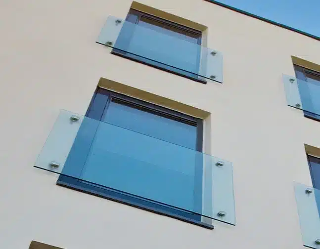 Glass Juliet Balconies on a clean beige wall