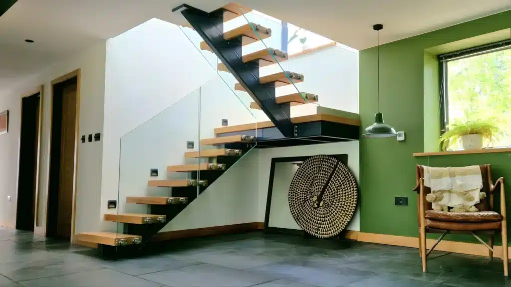 Frameless glass balustrade stair railing in bright nicely furnished home
